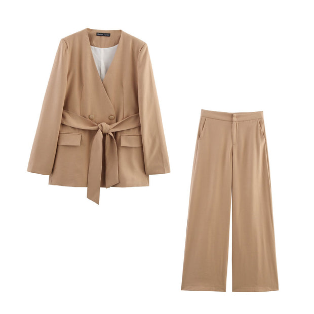 Beltique women's beige blazer with belt and matching trousers, Japanese-Korean casual style, long sleeve polyester set.