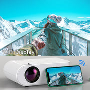 Mini Cast Pro WiFi projector displaying a scenic snowy mountain image from a smartphone.